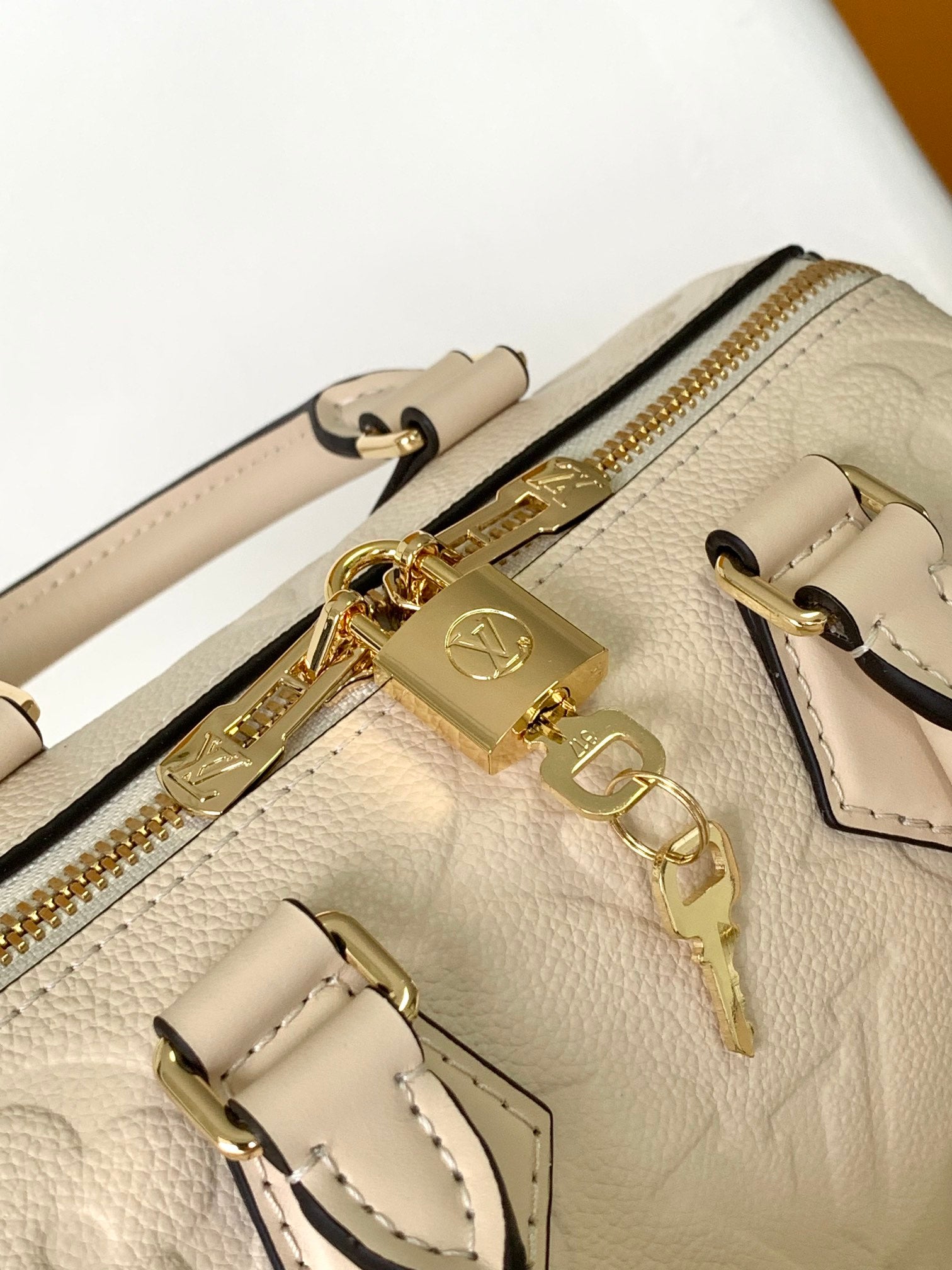Louis Vuitton Speedy Bandoulière 20 Monogram Empreinte Leather Handbag - Beige