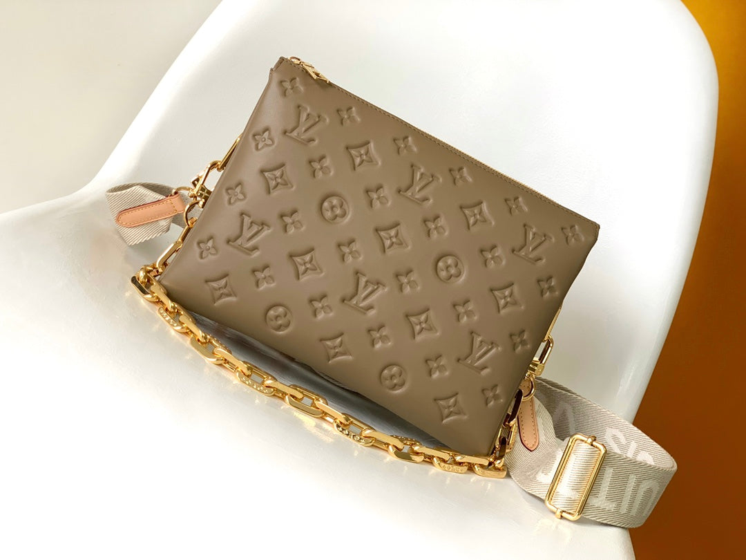 Louis Vuitton Coussin PM Bag in Taupe Monogram Embossed Puffy Lambskin