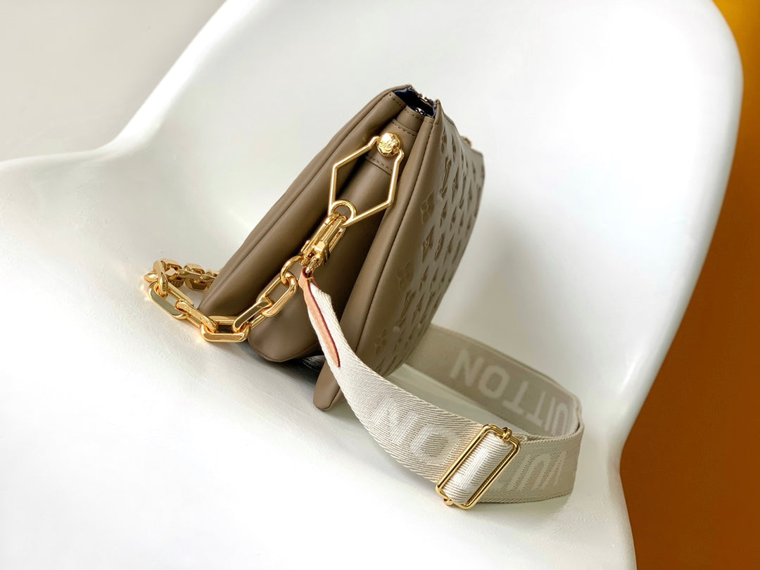 Louis Vuitton Coussin PM Bag in Taupe Monogram Embossed Puffy Lambskin