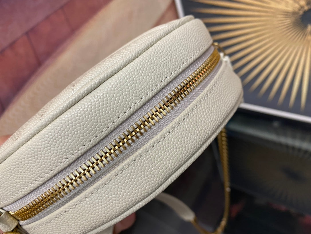 Saint Laurent Vinyle Round Camera Bag in Chevron-Quilted Leather - White