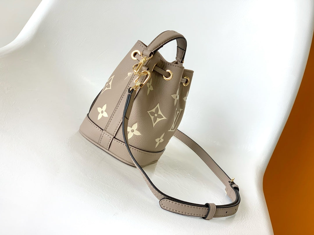 Louis Vuitton Nano Noé Bucket Bag - Bicolor Monogram Empreinte Leather - Turtledove/Cream
