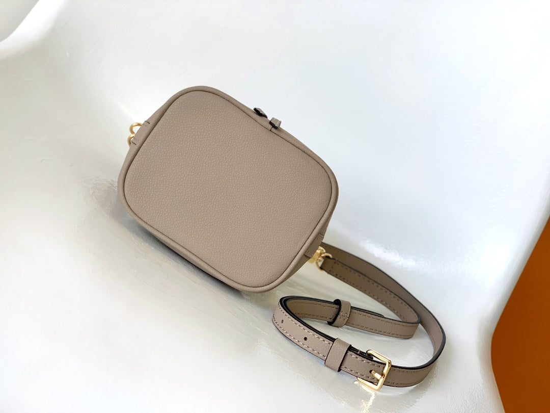 Louis Vuitton Nano Noé Bucket Bag - Bicolor Monogram Empreinte Leather - Turtledove/Cream
