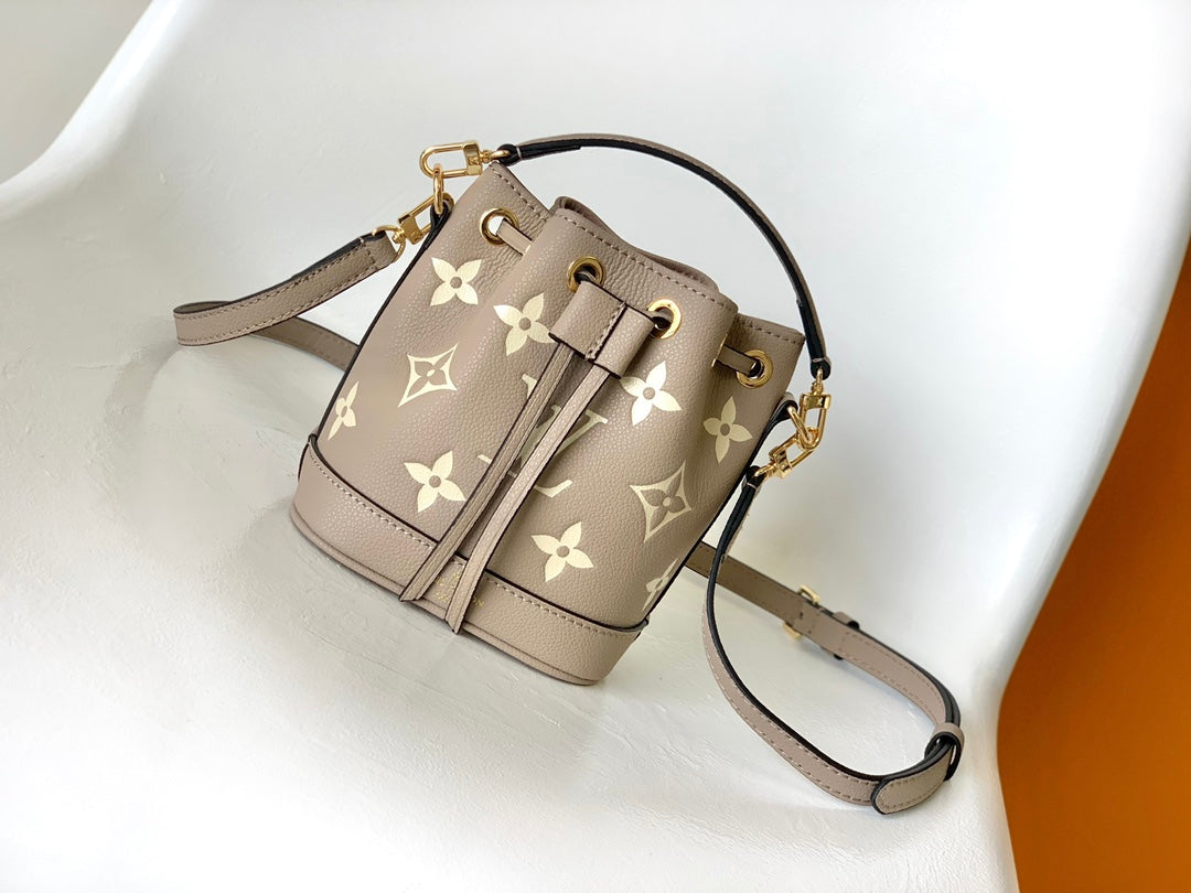 Louis Vuitton Nano Noé Bucket Bag - Bicolor Monogram Empreinte Leather - Turtledove/Cream
