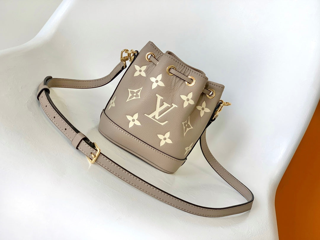 Louis Vuitton Nano Noé Bucket Bag - Bicolor Monogram Empreinte Leather - Turtledove/Cream