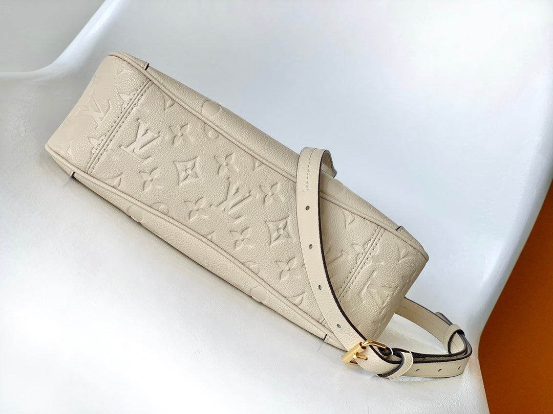 Louis Vuitton Monogram Empreinte Leather Handbag - Elegant Beige Top Handle Tote