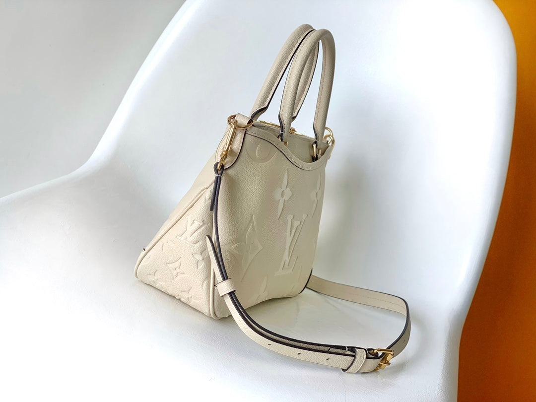 Louis Vuitton Monogram Empreinte Leather Handbag - Elegant Beige Top Handle Tote