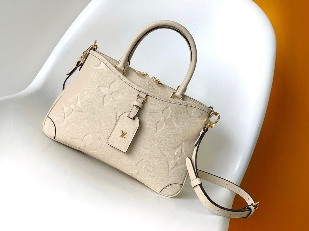 Louis Vuitton Monogram Empreinte Leather Handbag - Elegant Beige Top Handle Tote