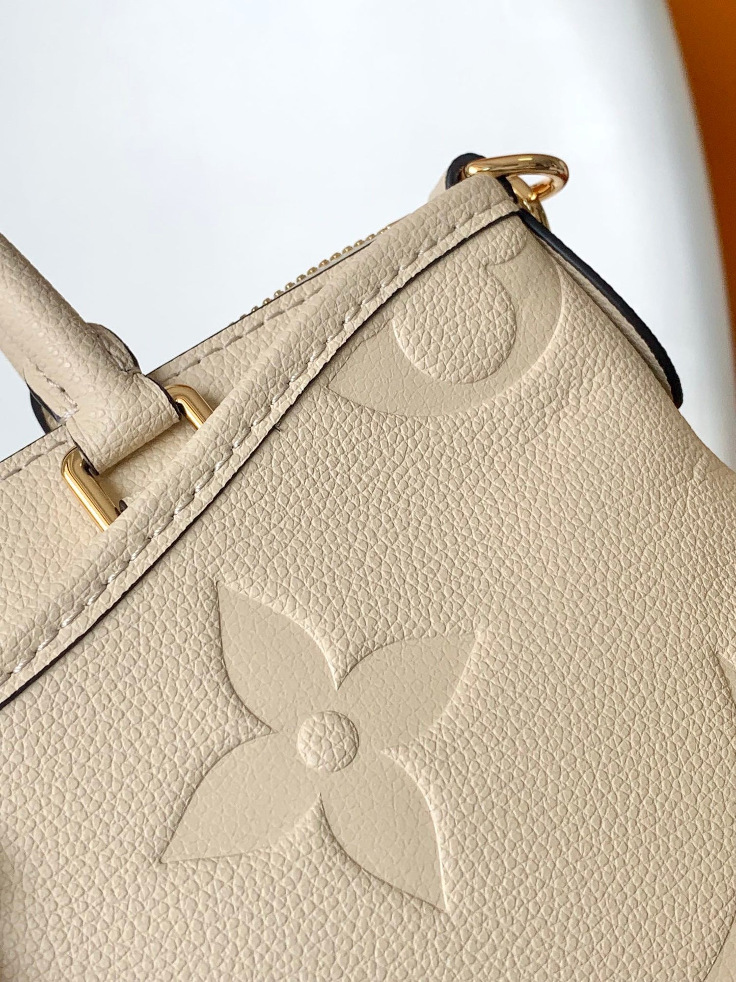 Louis Vuitton Monogram Empreinte Leather Handbag - Elegant Beige Top Handle Tote