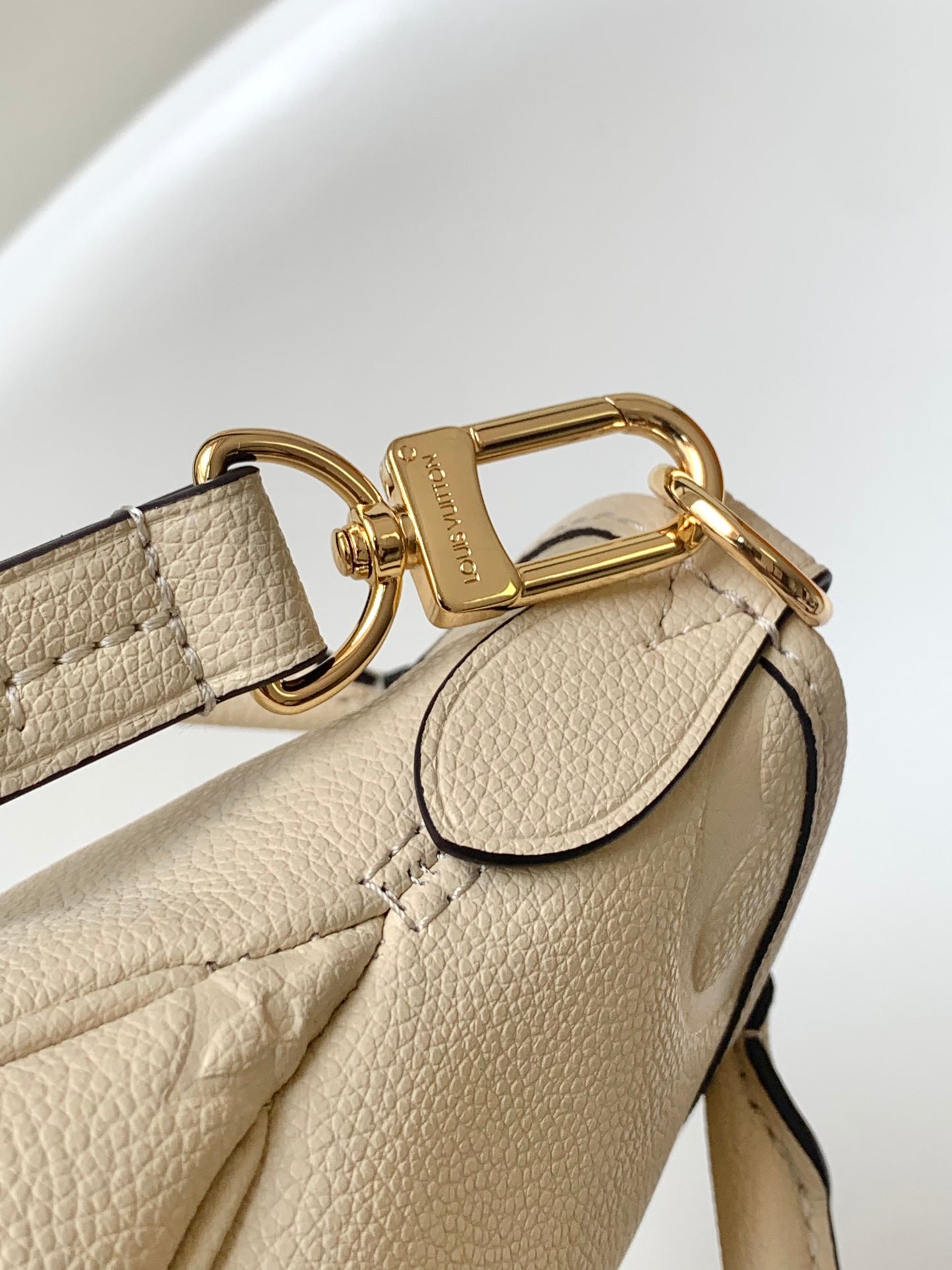 Louis Vuitton Monogram Empreinte Leather Handbag - Elegant Beige Top Handle Tote