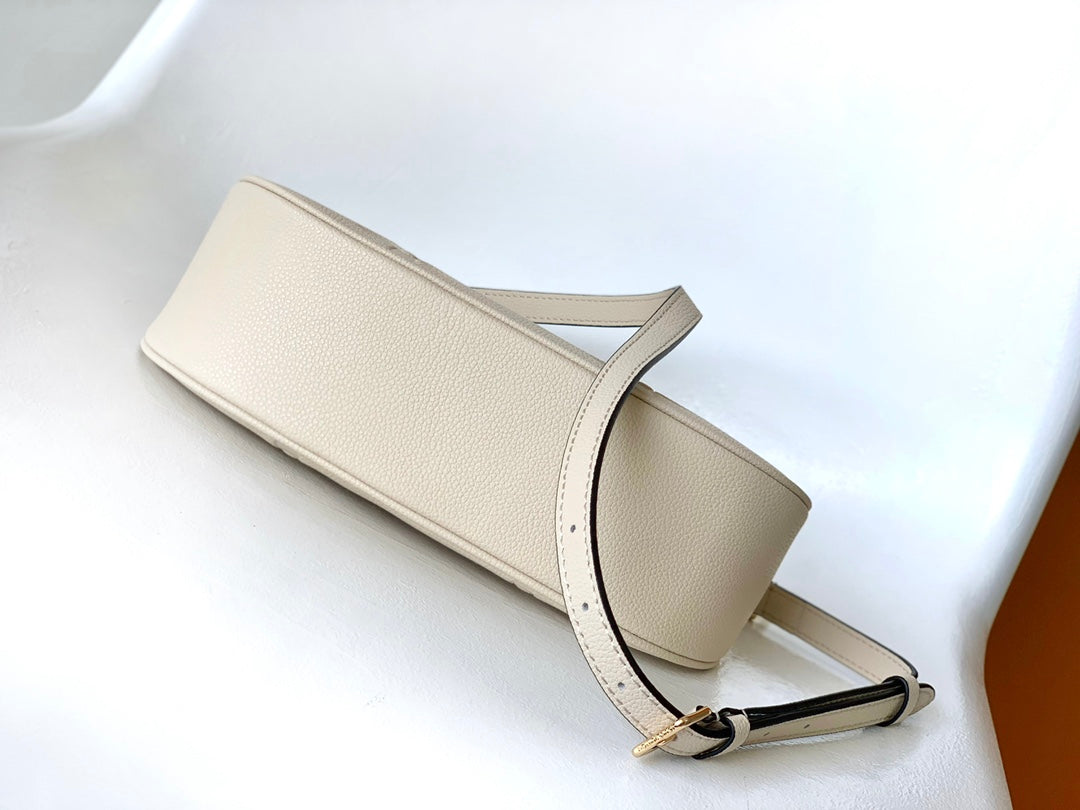 Louis Vuitton Bagatelle Hobo Bag in Monogram Empreinte Leather - Crème Beige