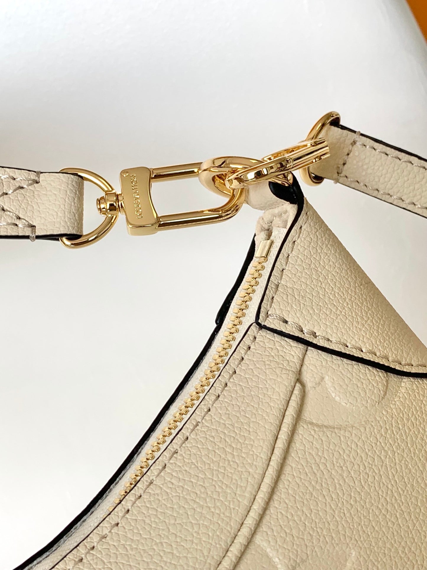 Louis Vuitton Bagatelle Hobo Bag in Monogram Empreinte Leather - Crème Beige