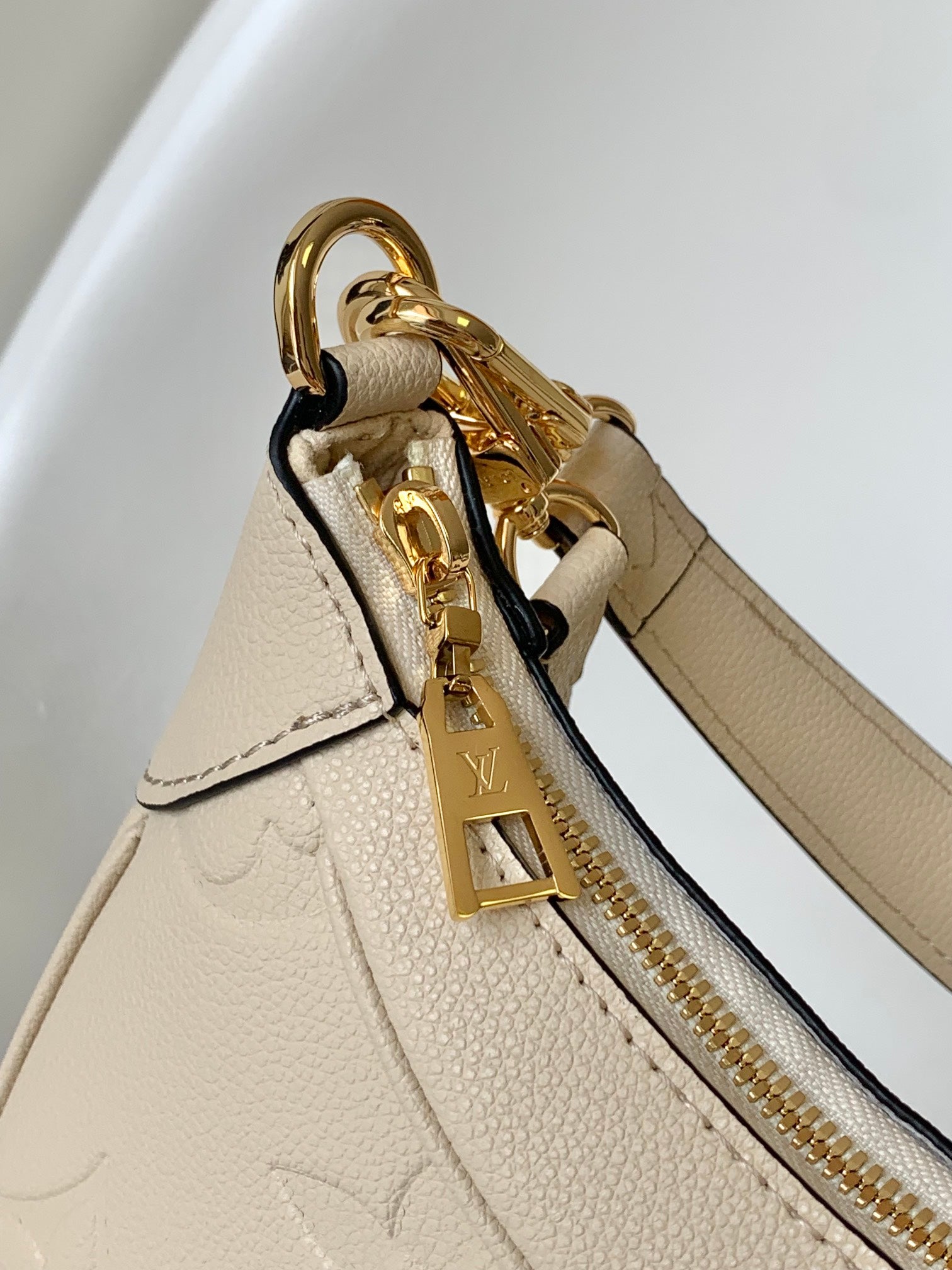 Louis Vuitton Bagatelle Hobo Bag in Monogram Empreinte Leather - Crème Beige