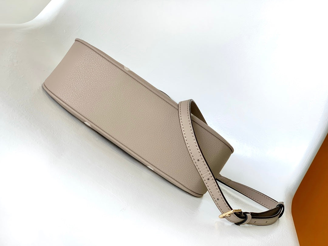 Louis Vuitton Over the Moon Monogram Empreinte Leather Handbag - Turtledove