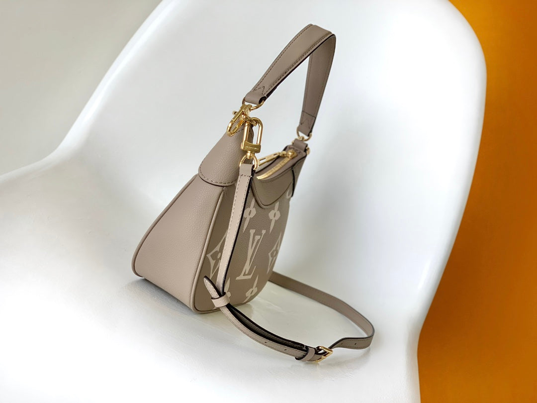Louis Vuitton Over the Moon Monogram Empreinte Leather Handbag - Turtledove