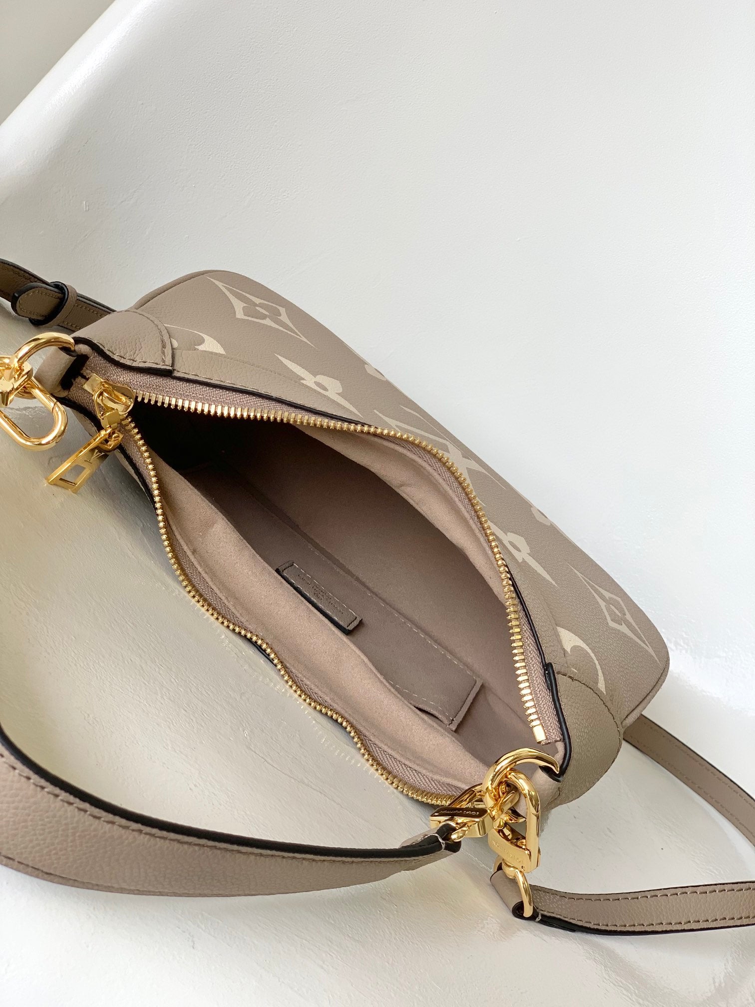 Louis Vuitton Over the Moon Monogram Empreinte Leather Handbag - Turtledove