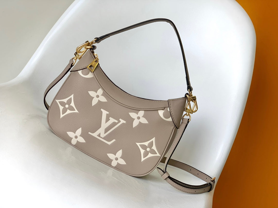 Louis Vuitton Over the Moon Monogram Empreinte Leather Handbag - Turtledove