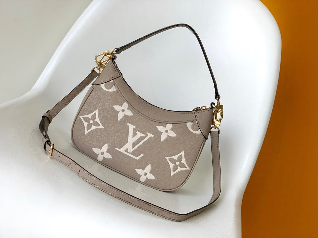 Louis Vuitton Over the Moon Monogram Empreinte Leather Handbag - Turtledove