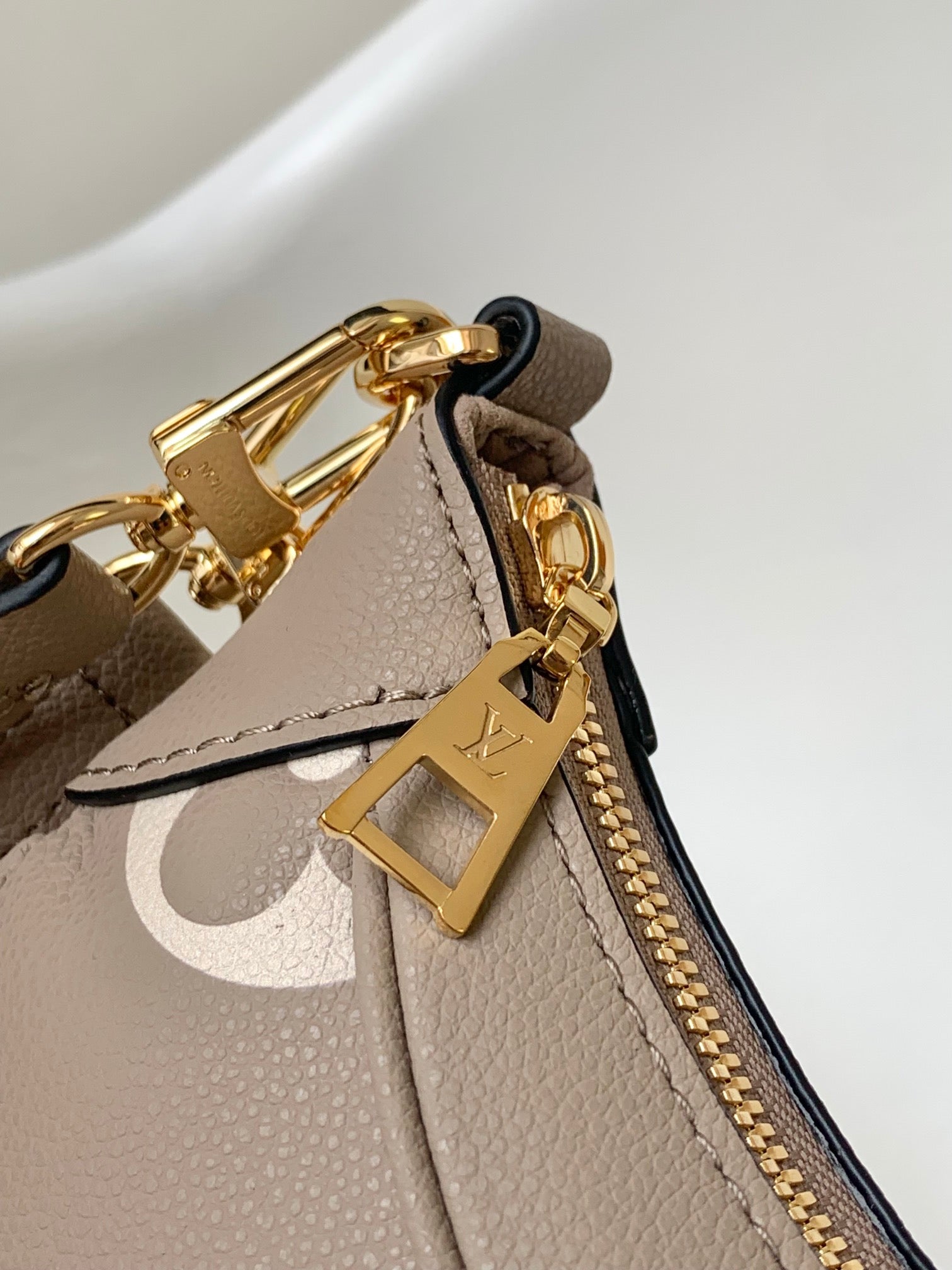 Louis Vuitton Over the Moon Monogram Empreinte Leather Handbag - Turtledove