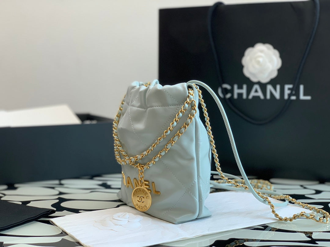 Chanel Mini Drawstring Pouch Bag with Gold-Tone Chain and Coin Charm - Mint Green