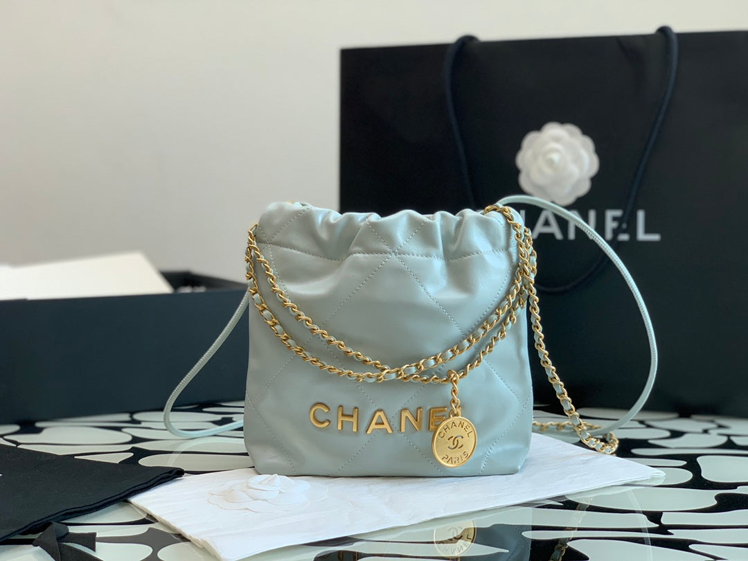 Chanel Mini Drawstring Pouch Bag with Gold-Tone Chain and Coin Charm - Mint Green