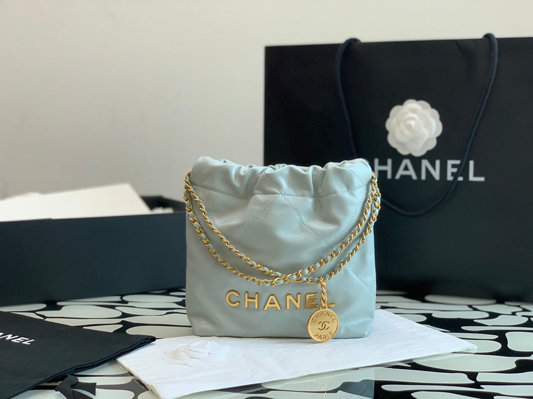 Chanel Mini Drawstring Pouch Bag with Gold-Tone Chain and Coin Charm - Mint Green