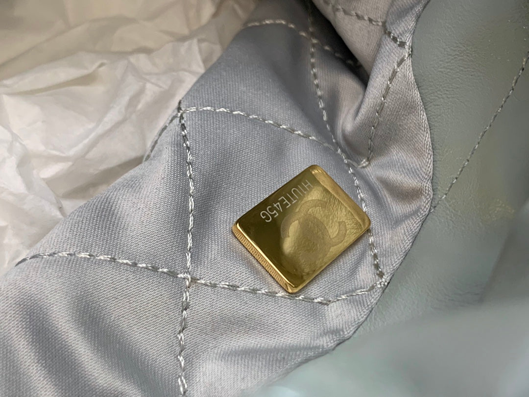 Chanel Mini Drawstring Pouch Bag with Gold-Tone Chain and Coin Charm - Mint Green
