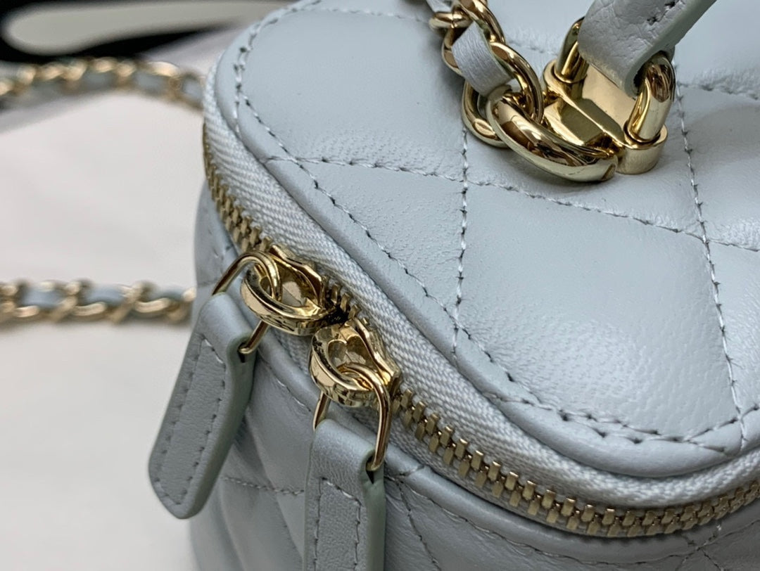 Chanel Quilted Light Blue Vanity Bag with Top Handle and Gold-Tone Hardware