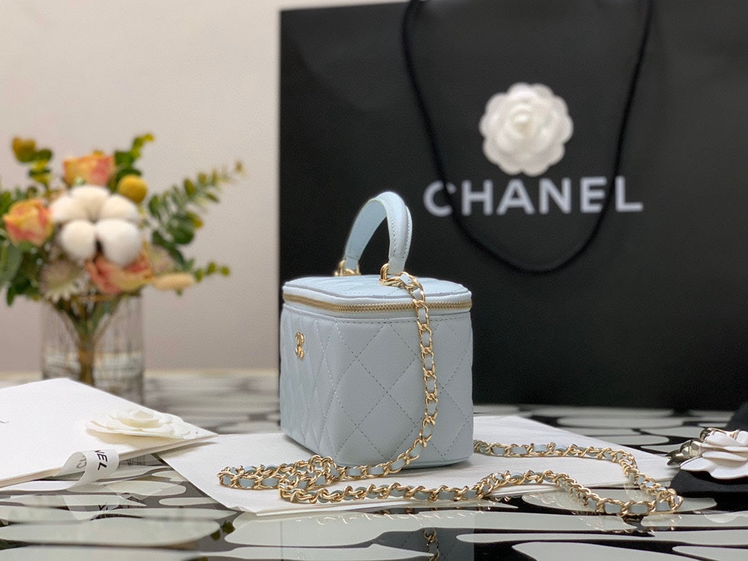 Chanel Quilted Light Blue Vanity Bag with Top Handle and Gold-Tone Hardware