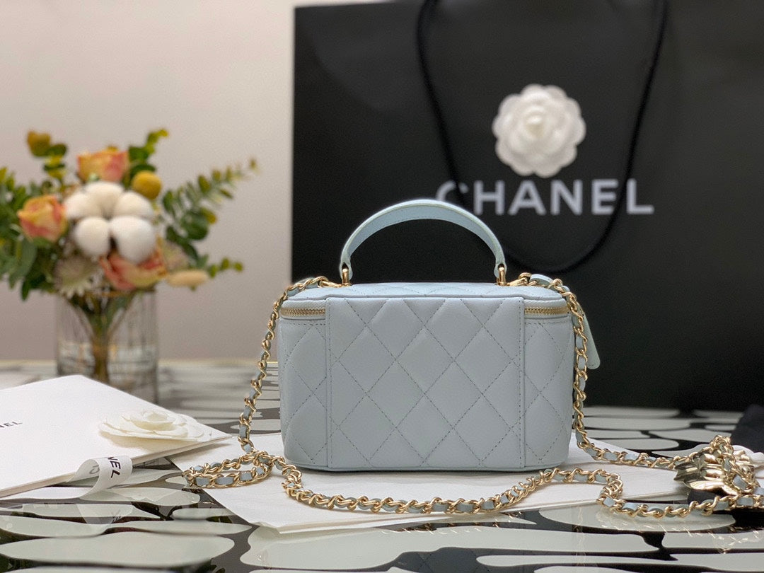 Chanel Quilted Light Blue Vanity Bag with Top Handle and Gold-Tone Hardware