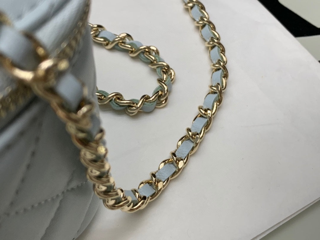 Chanel Quilted Light Blue Vanity Bag with Top Handle and Gold-Tone Hardware