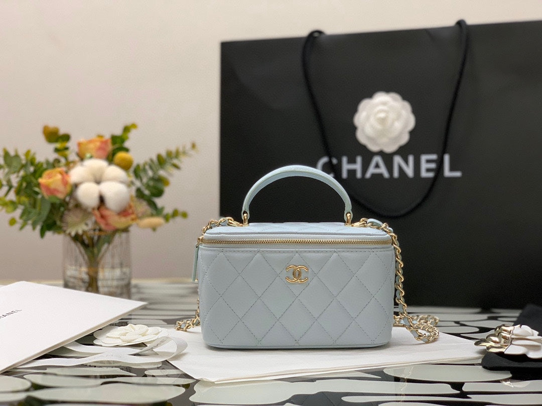 Chanel Quilted Light Blue Vanity Bag with Top Handle and Gold-Tone Hardware