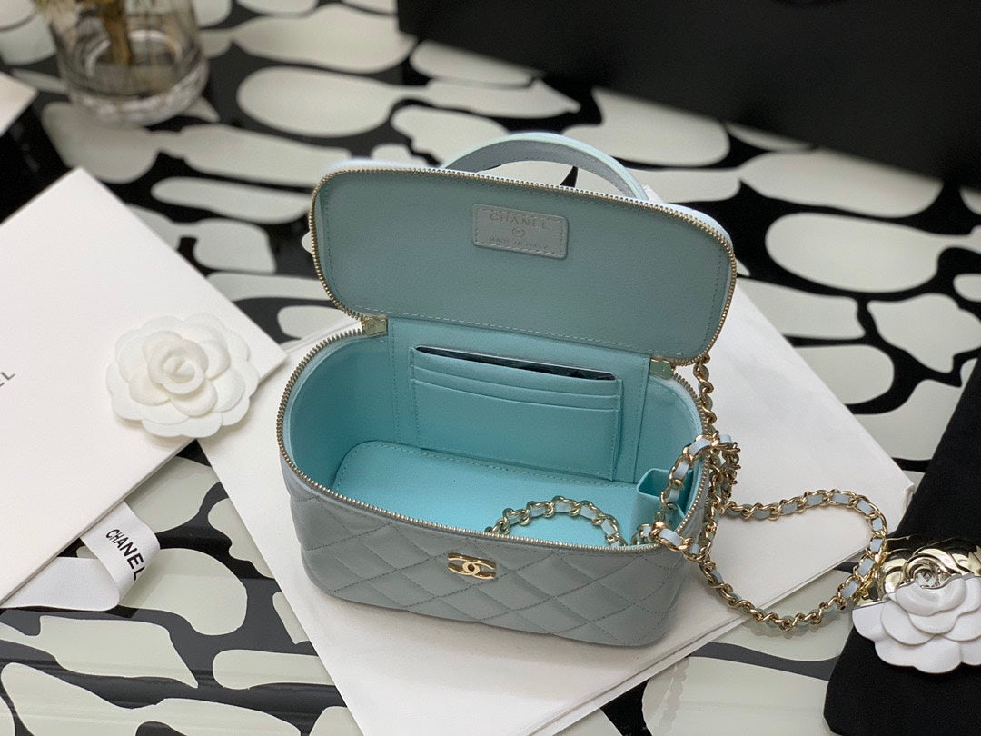 Chanel Quilted Light Blue Vanity Bag with Top Handle and Gold-Tone Hardware