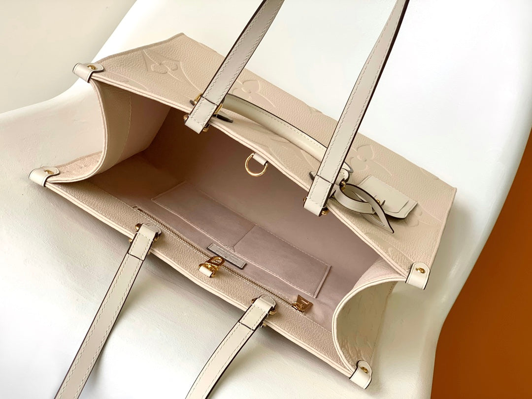 Louis Vuitton Onthego MM Monogram Empreinte Leather Tote Bag - Cream