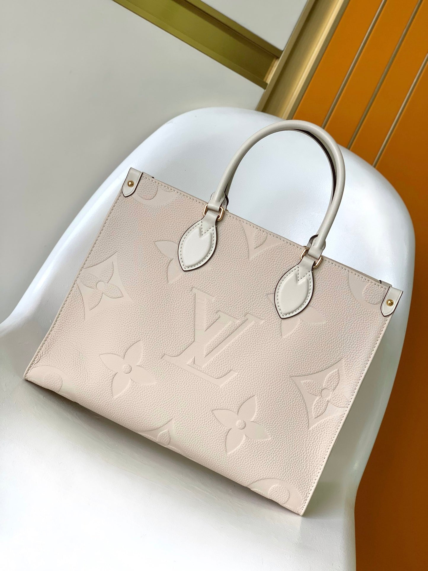 Louis Vuitton Onthego MM Monogram Empreinte Leather Tote Bag - Cream