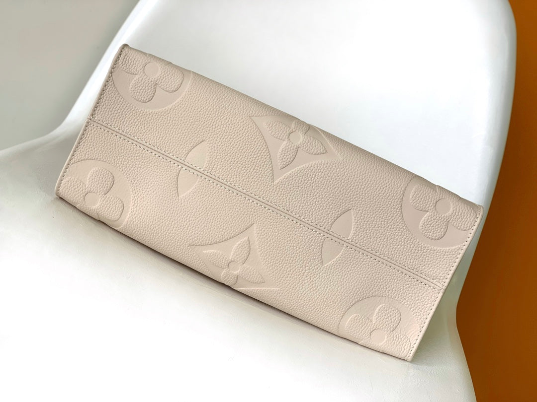 Louis Vuitton Onthego MM Monogram Empreinte Leather Tote Bag - Cream