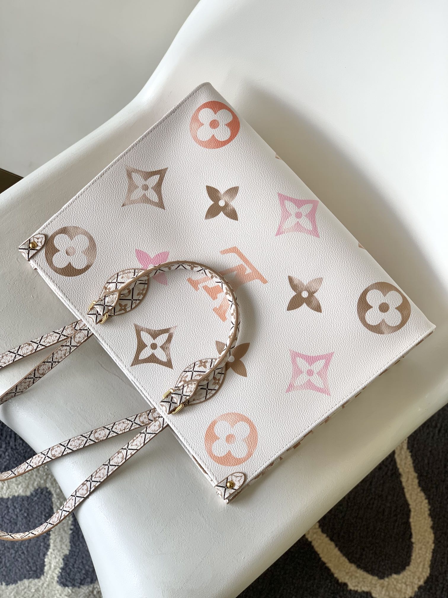 Louis Vuitton Onthego MM Monogram Empreinte Leather Tote Bag - Pastel White/Pink