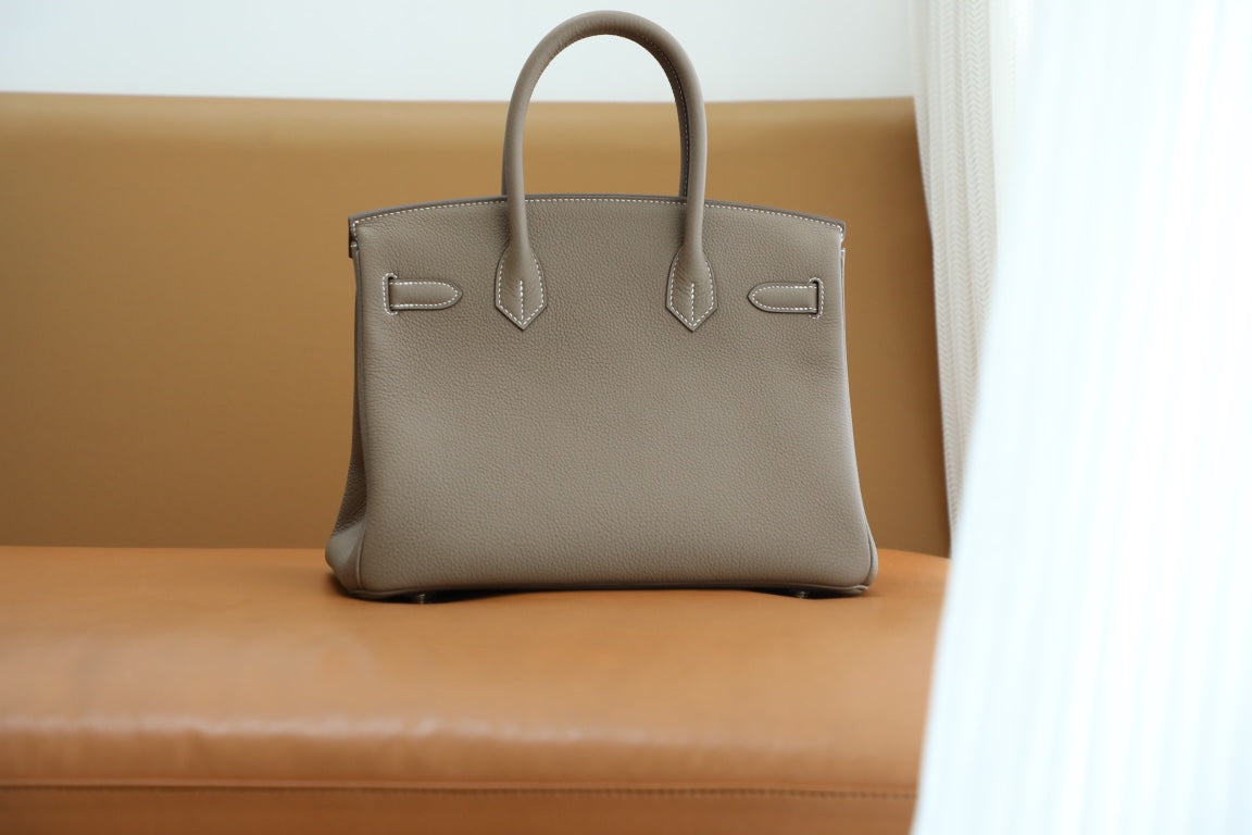 Elegant Taupe Leather Top-Handle Handbag with Gold-Tone Hardware