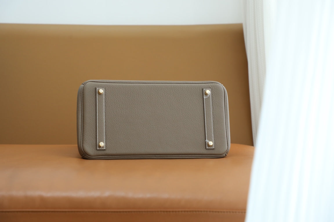 Elegant Taupe Leather Top-Handle Handbag with Gold-Tone Hardware