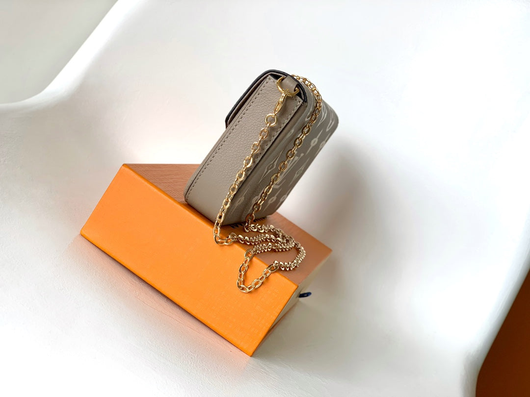 Louis Vuitton Félicie Pochette Monogram Empreinte Leather - Turtledove/Cream