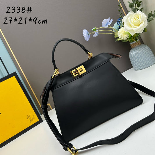 Elegant Black Structured Handbag with Gold Hardware and Shoulder Strap - 27cm x 21cm x 9cm