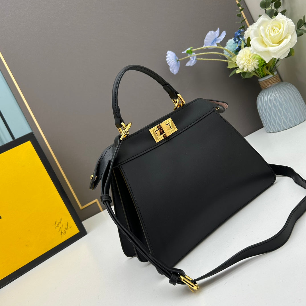 Elegant Black Structured Handbag with Gold Hardware and Shoulder Strap - 27cm x 21cm x 9cm