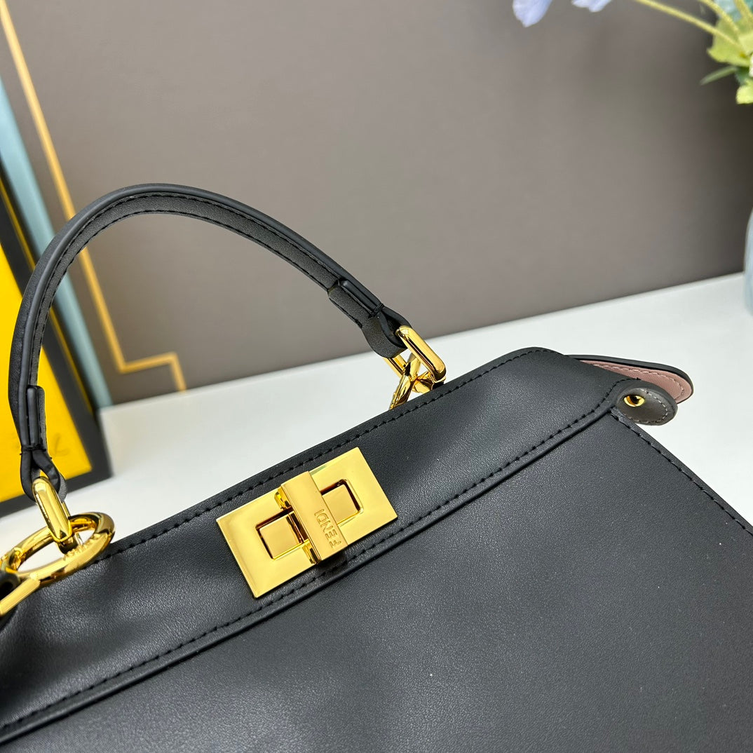 Elegant Black Structured Handbag with Gold Hardware and Shoulder Strap - 27cm x 21cm x 9cm