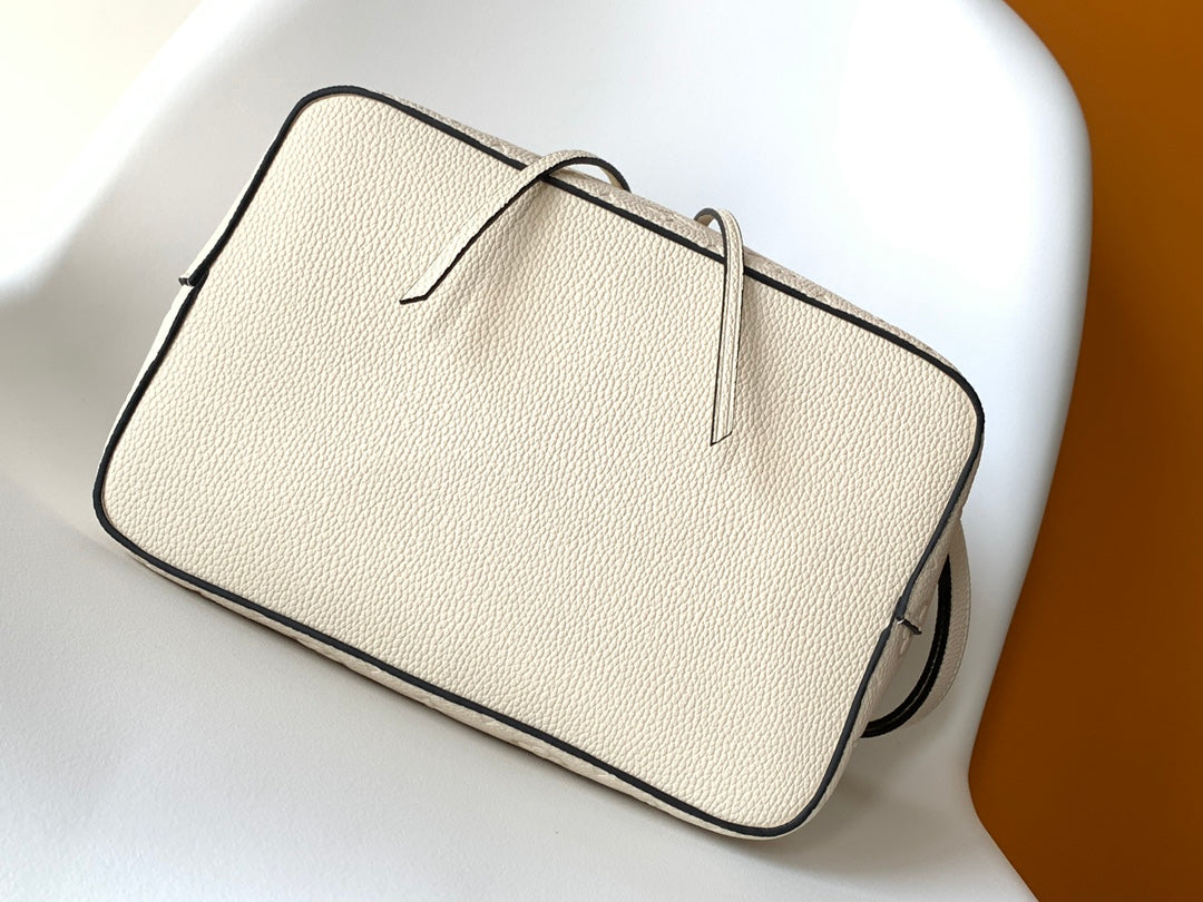Louis Vuitton NéoNoé MM Monogram Empreinte Leather Bucket Bag - Cream
