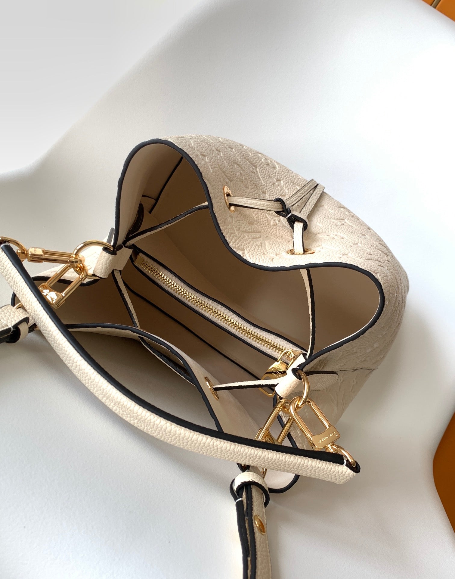 Louis Vuitton NéoNoé MM Monogram Empreinte Leather Bucket Bag - Cream