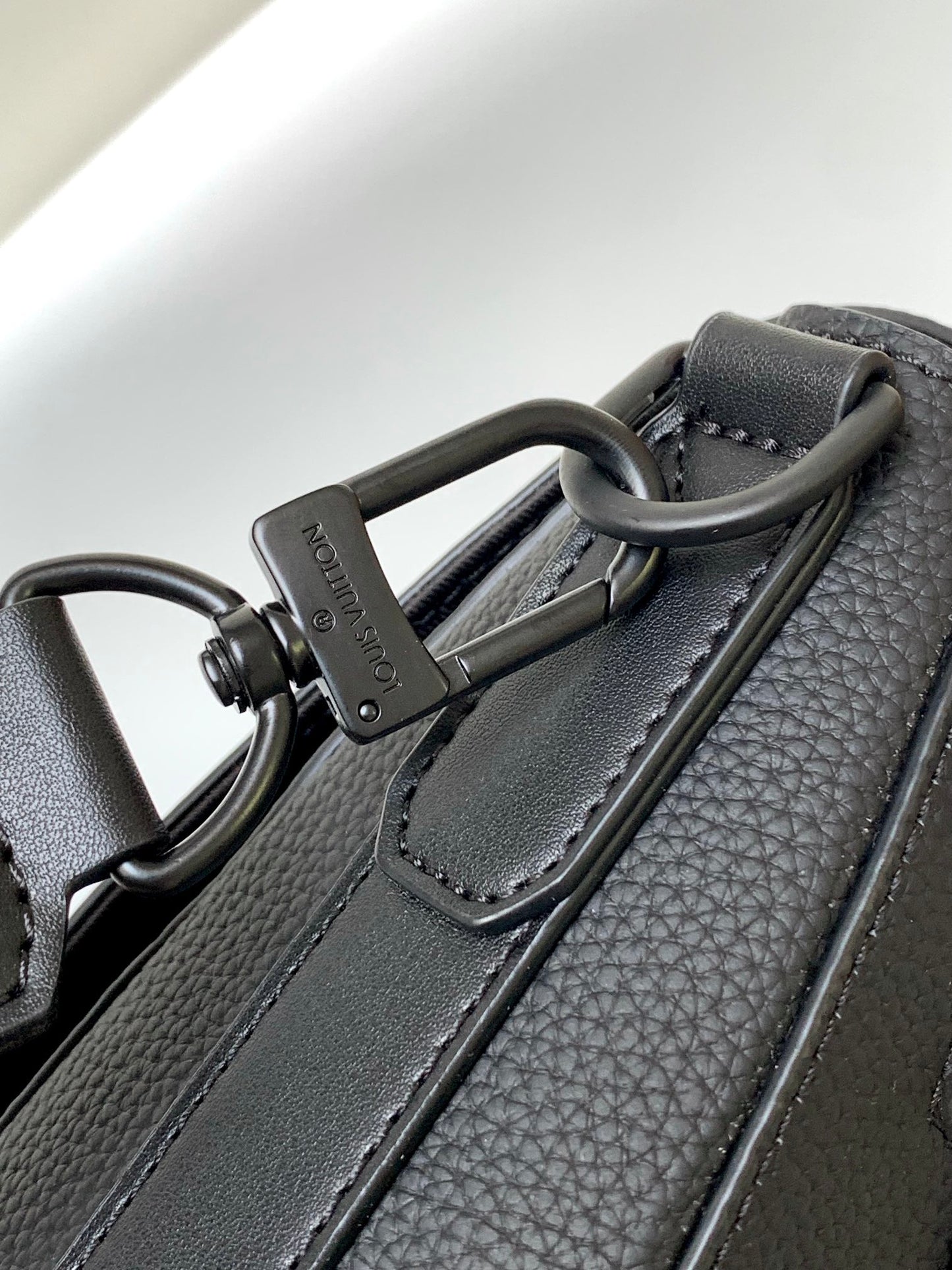 Louis Vuitton Minimalist Black Leather Messenger Bag with Wide Crossbody Strap