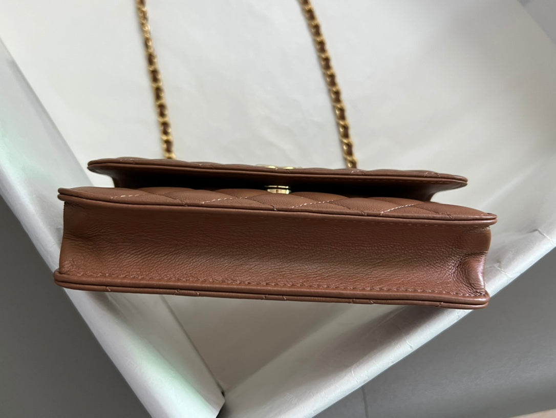 Brown Quilted Handbag with Jeweled Top Handle and Gold Chain Strap