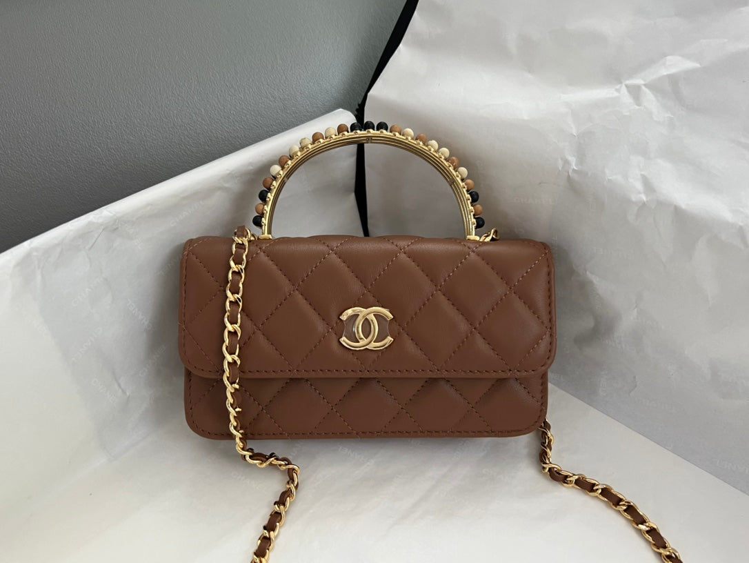 Brown Quilted Handbag with Jeweled Top Handle and Gold Chain Strap