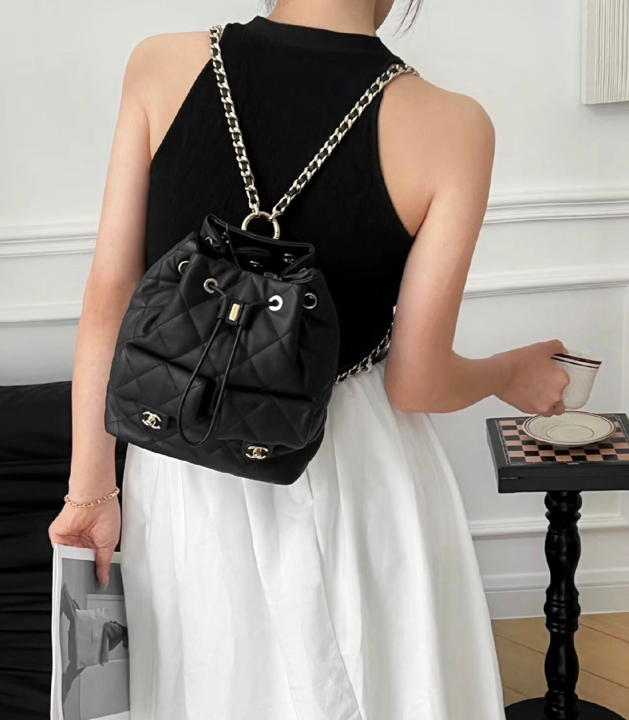 Women's Small Black Quilted Leather Bucket Backpack - Mini Drawstring Bag with Chain Straps