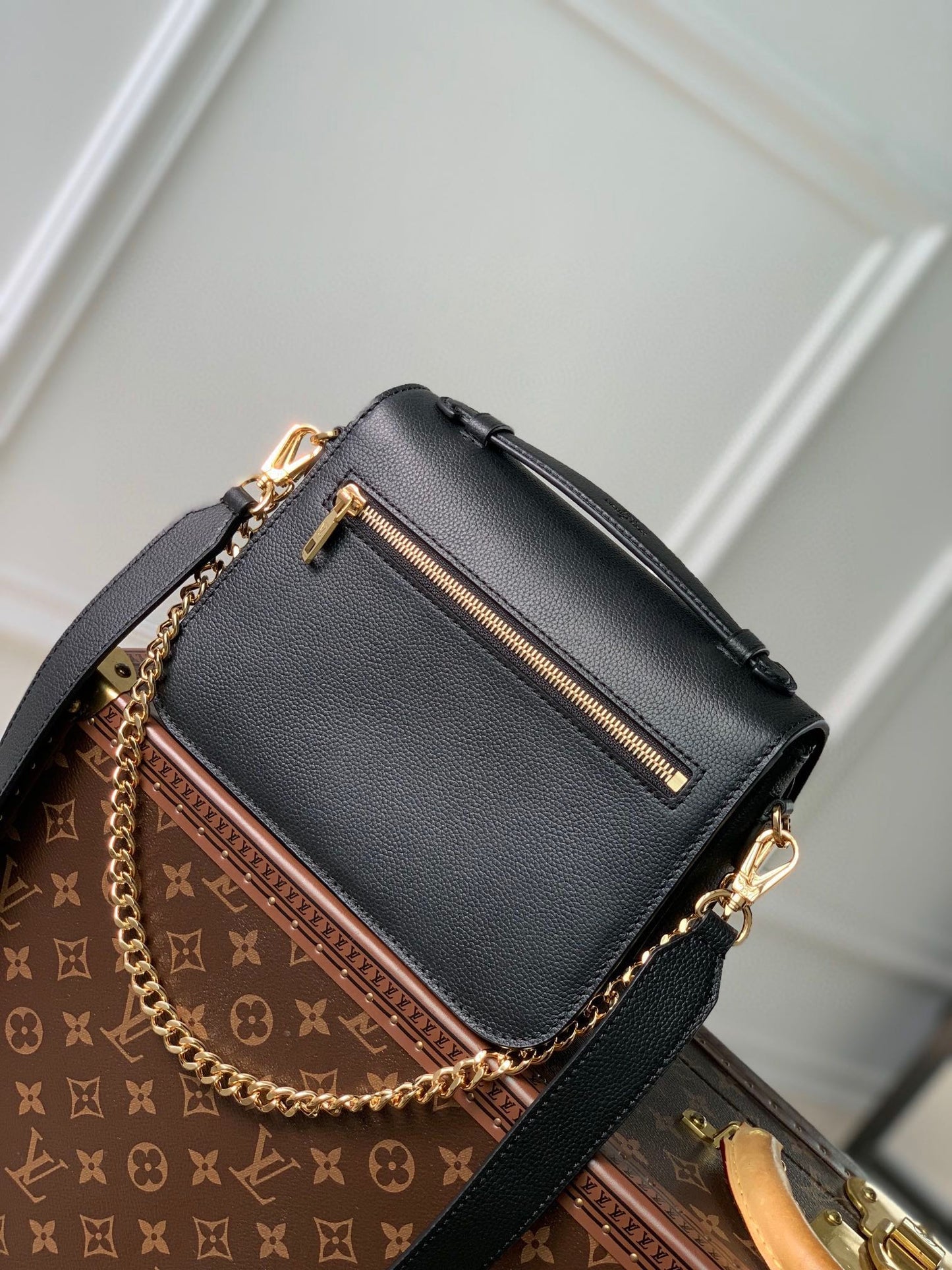 Elegant Black Crossbody Bag with Gold-Tone Hardware and Top Handle