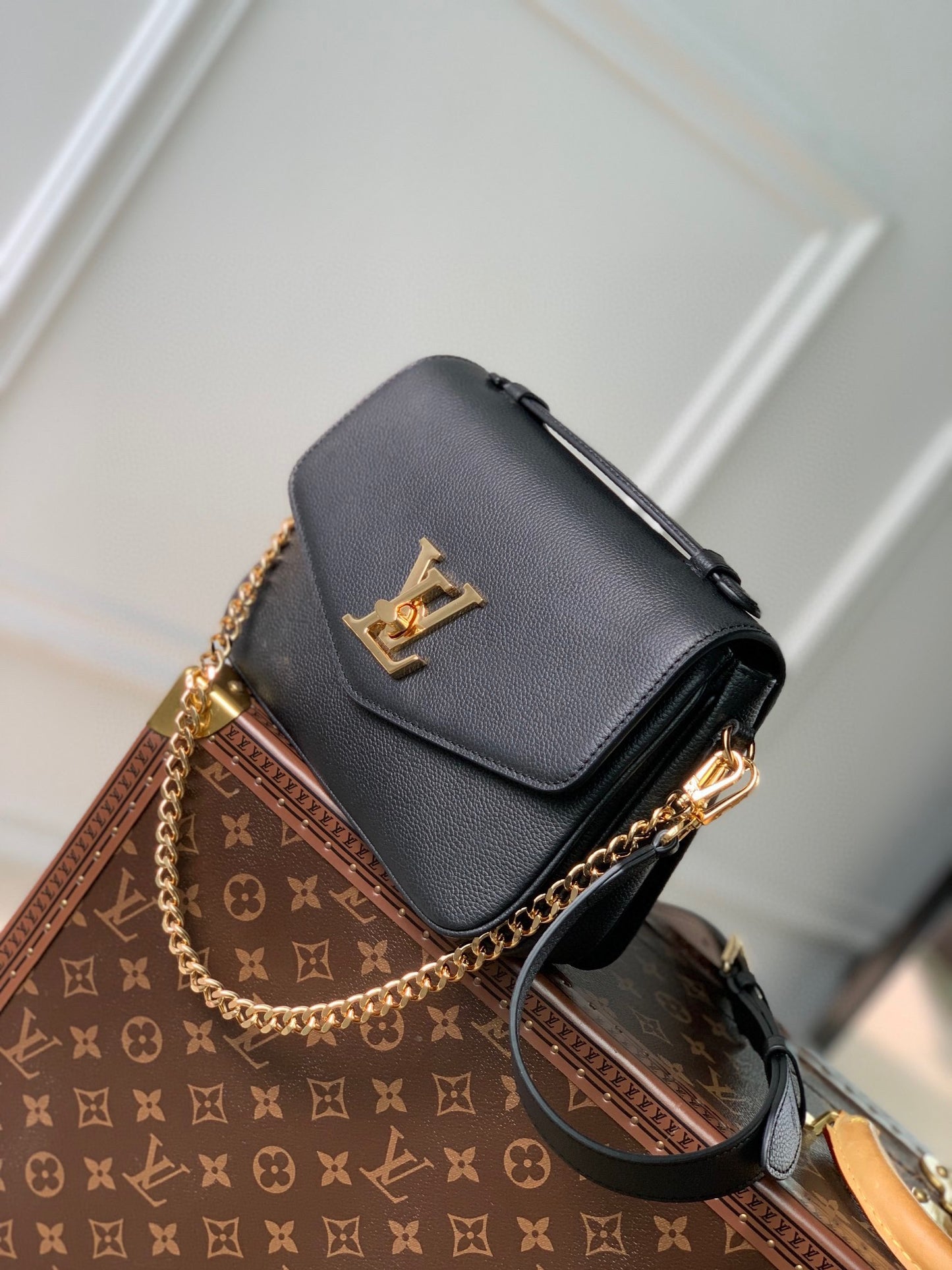 Elegant Black Crossbody Bag with Gold-Tone Hardware and Top Handle